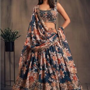 Blue floral lehenga, never worn, still in packaging, size XS
